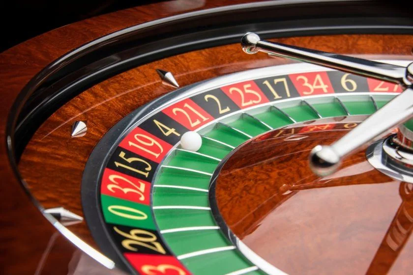 A colorful roulette wheel in a casino