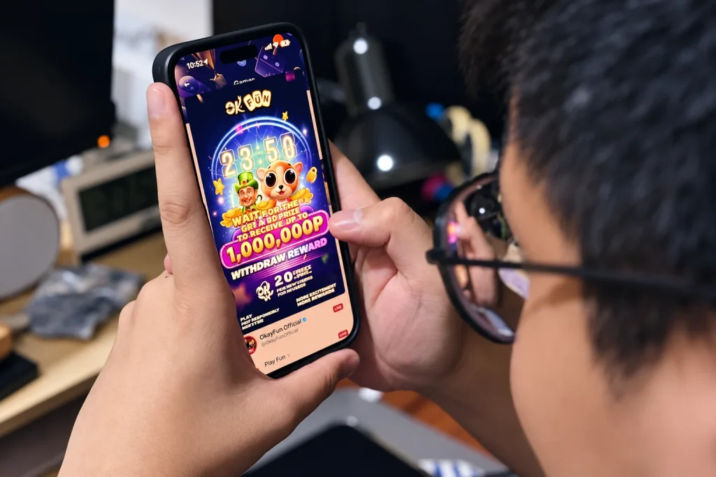 Individual with a smartphone featuring an online casino game